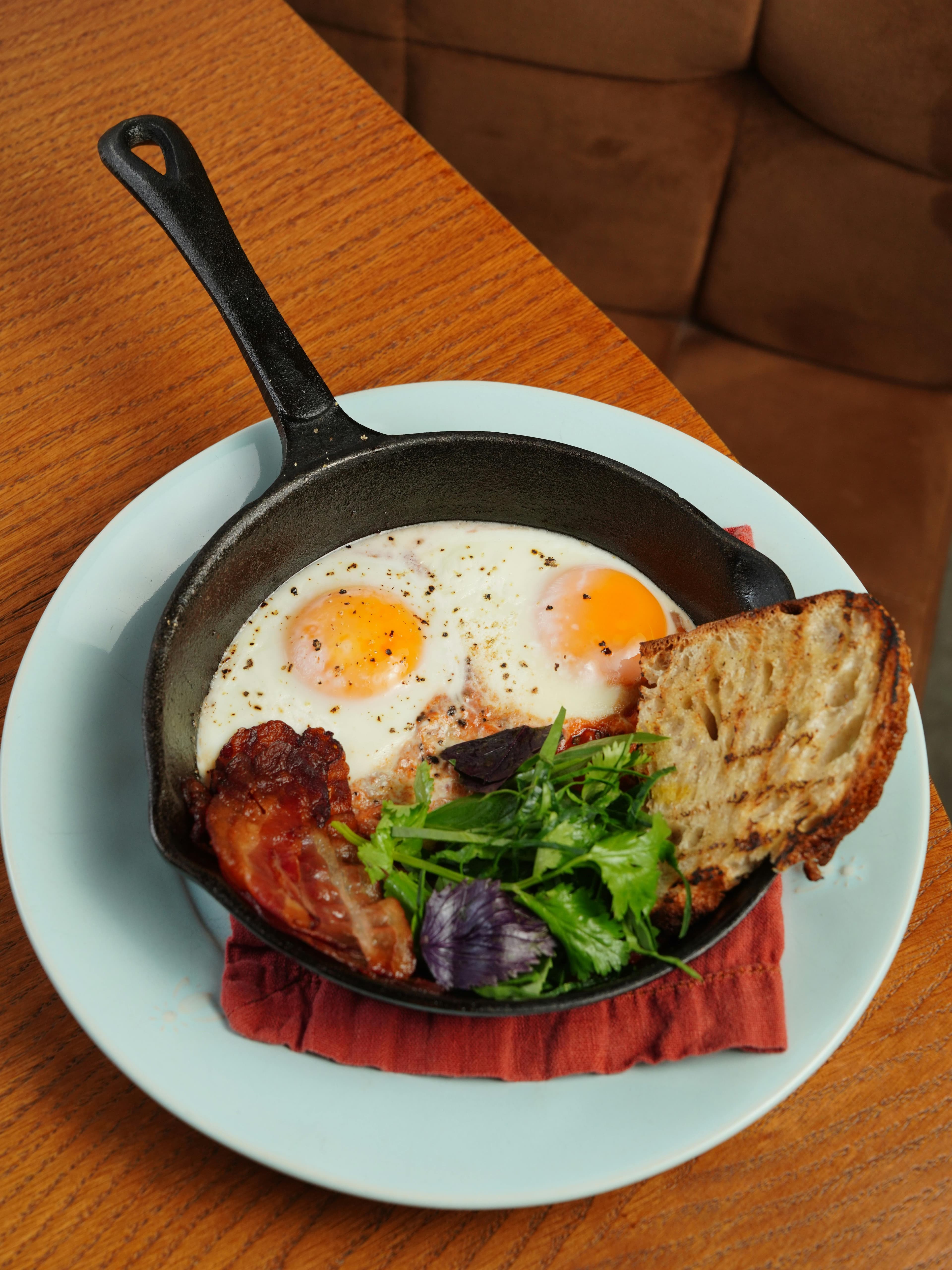 Savory cottage cheese and egg toast with herbs on toasted sourdough