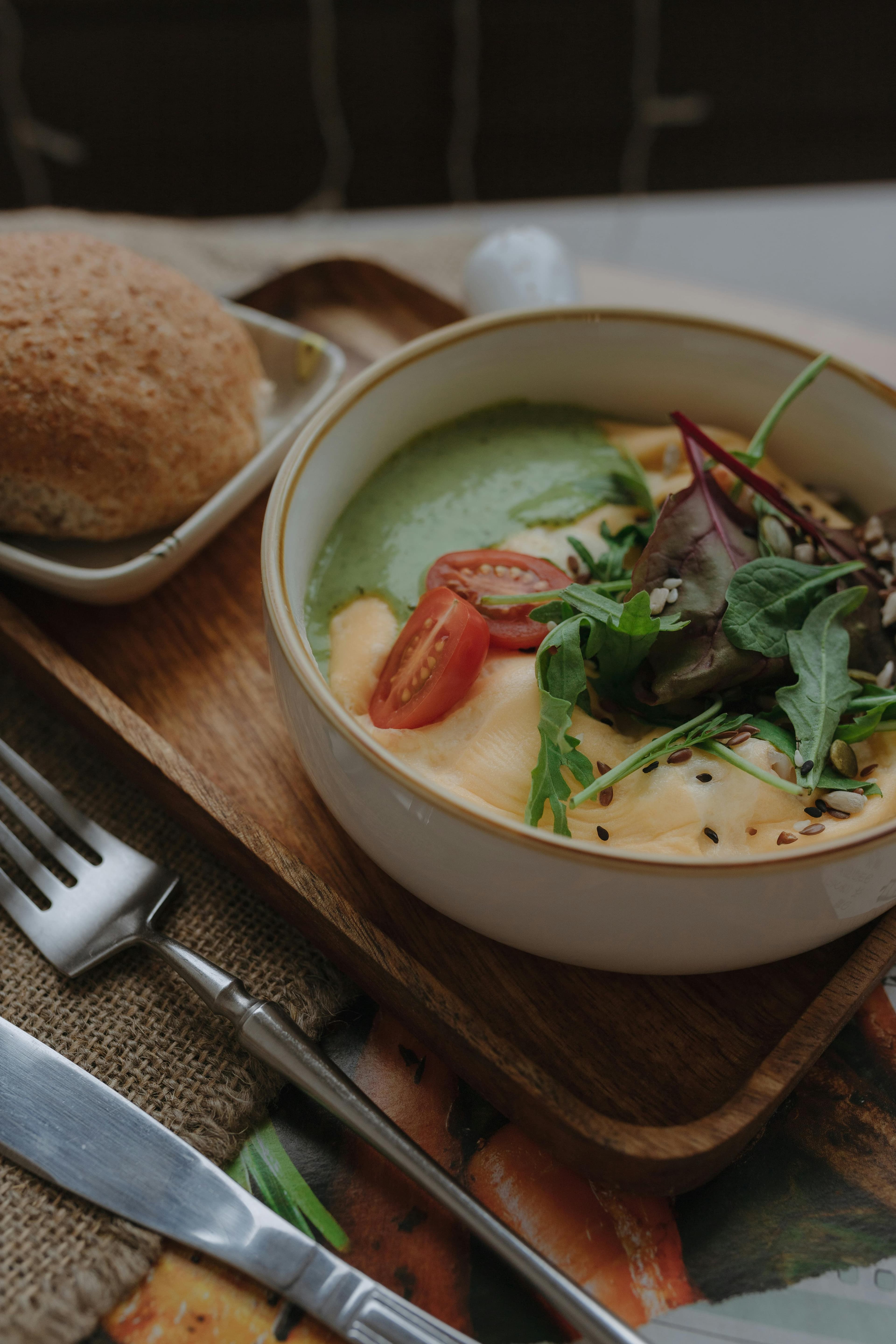 White bean vegetable soup with greens and broth in a comforting bowl